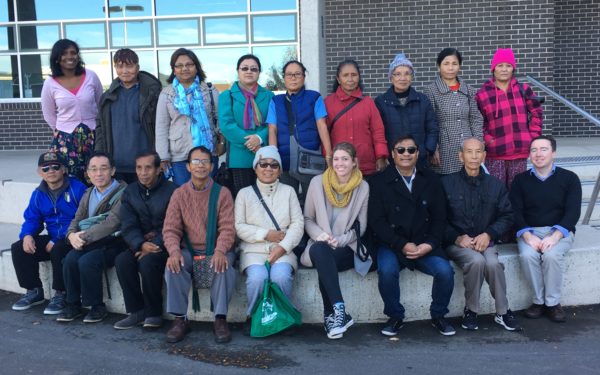 Settlement Program staff and Burmese participants at a group excursion to Sunshine Library.